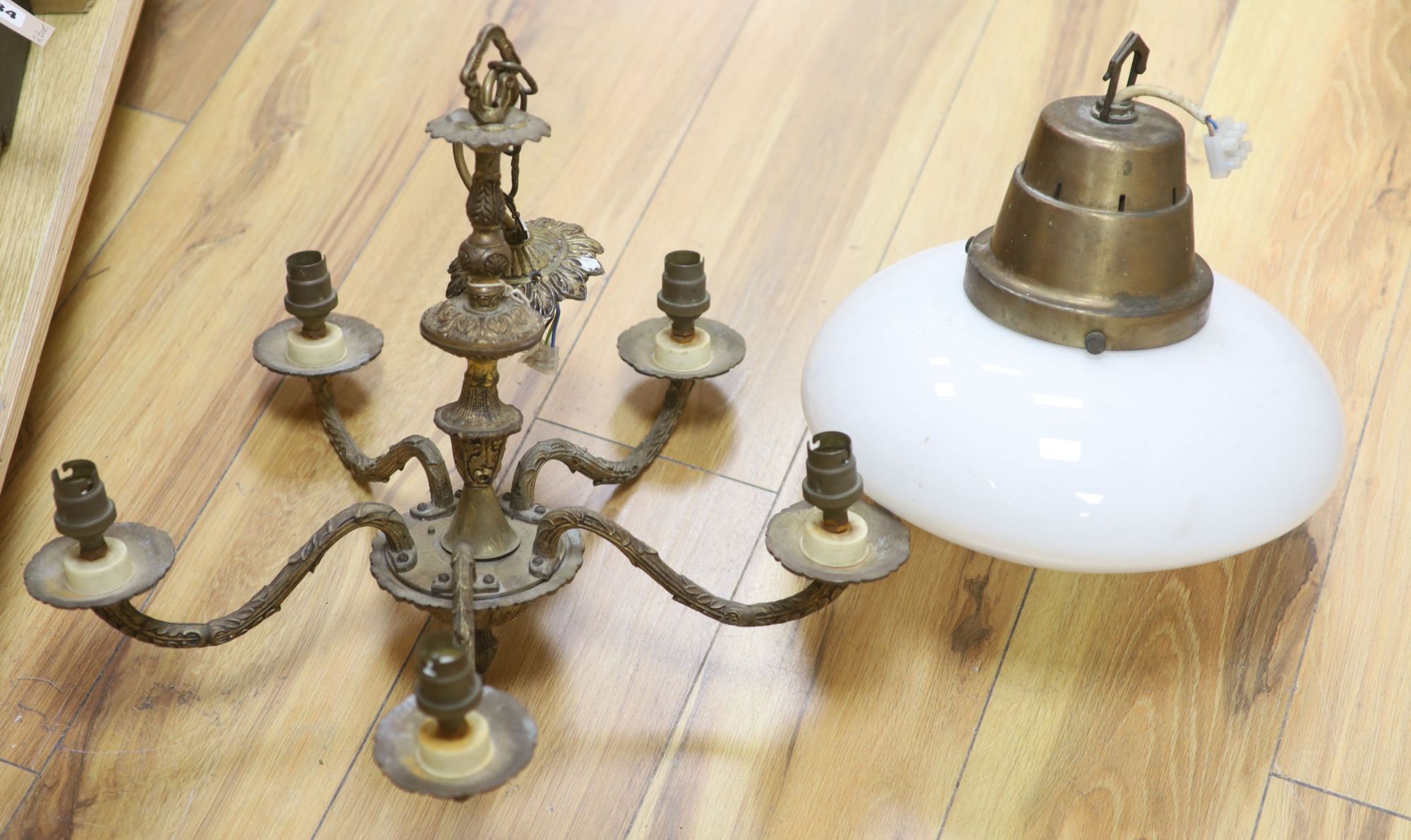 An Art Deco brass and opaline pendant light and a gilt five branch Victorian style chandelier (2)